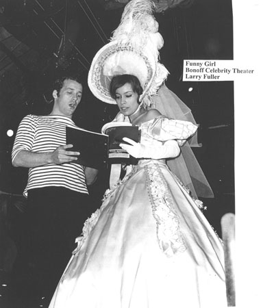 Larry Fuller, one of the choreographers who worked at the Star Theatre, goes over the script with a member of the chorus.