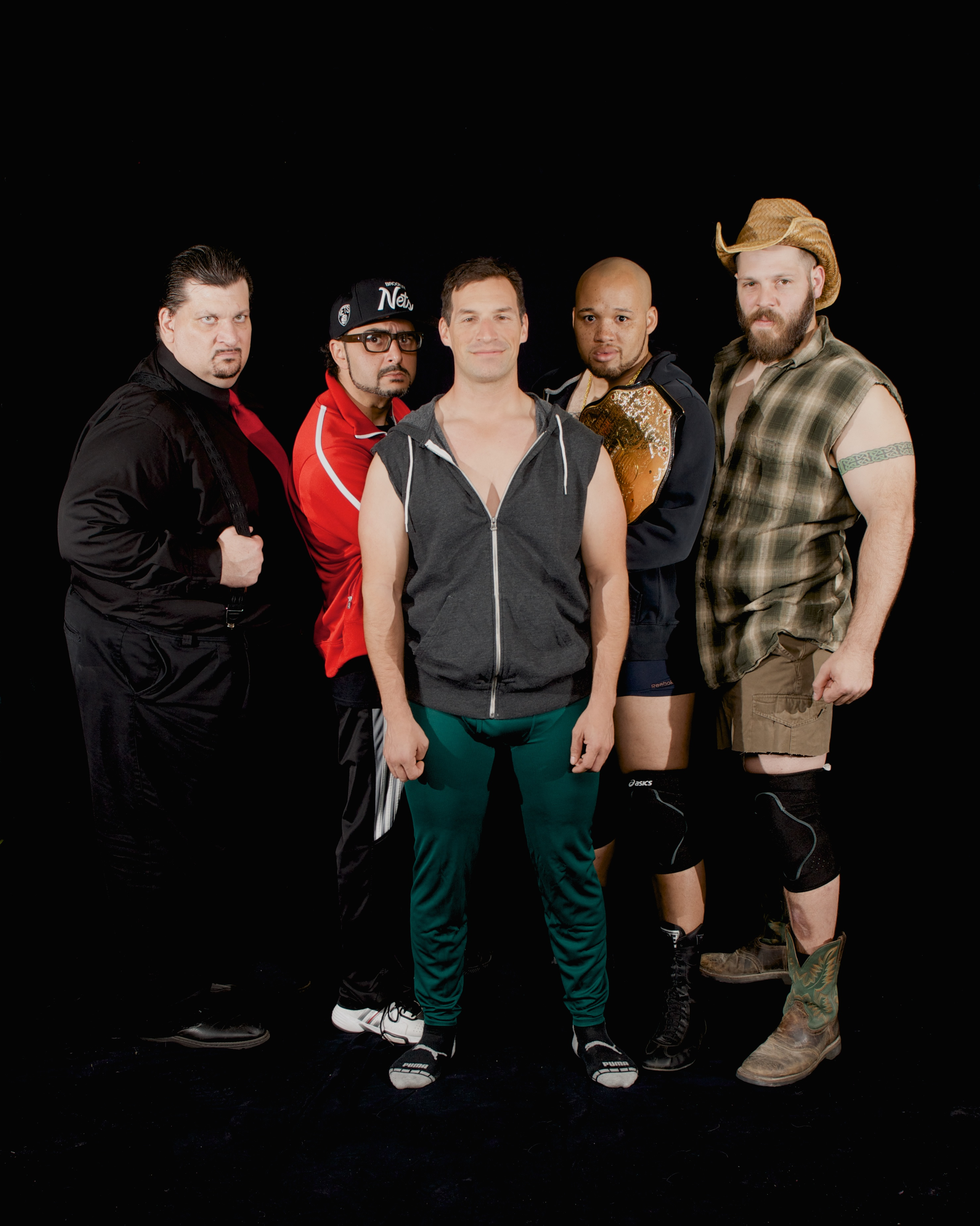 Stray Cat Theatre, "The Elaborate Entrance of Chad Deity," April 2014. Pictured: (l to r) Charles Campbell as EKO, Pasha Yamotahari as VP, Cisco Saavedra as Mace, Jeremy Gillett as Chad Deity and Keath David Hall as The Bad Guy. Photo by John Groseclose.