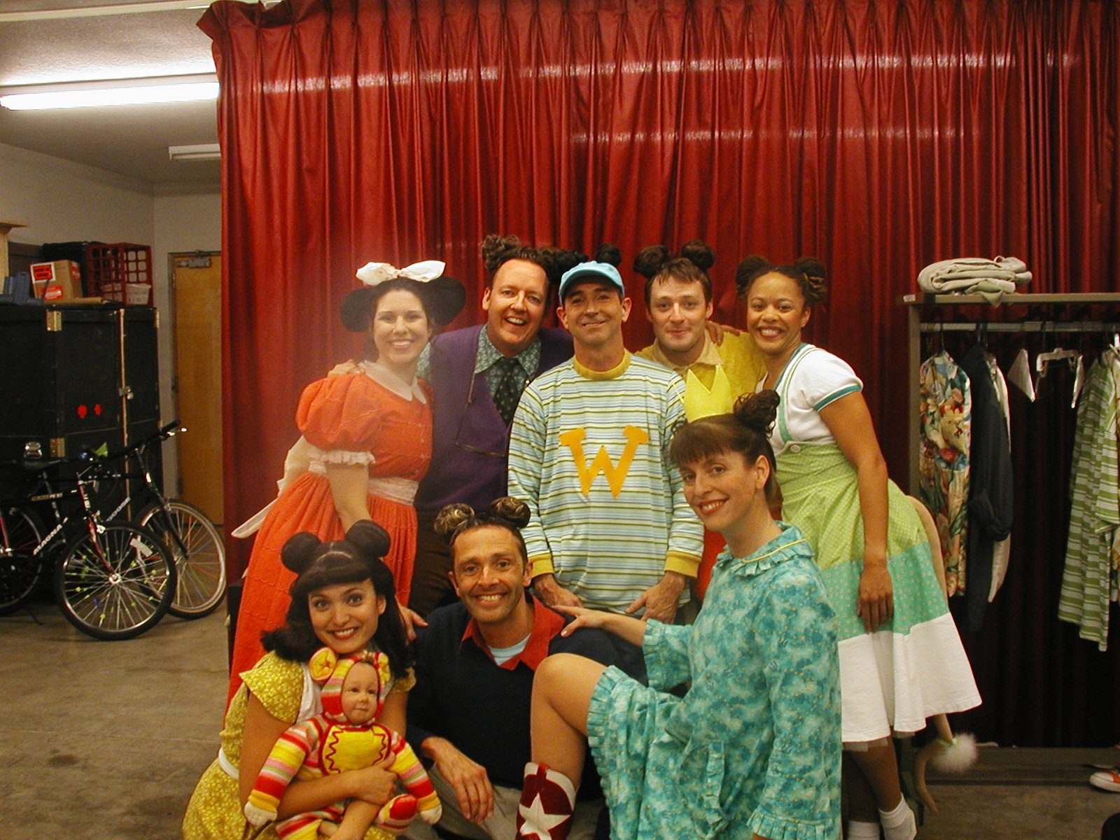 Childsplay, "Lilly's Purple Plastic Purse," 2002-2003. Top: Andrea Morales, D. Scott Withers, Jon Gentry, Kyle Sorrell, Kimberly Morgan. Bottom: Angelica Howland, Creepy Mouse Baby (in Angelica's arms), Dwayne Hartford, Katie McFadzen. (Photo from the collection of Angelica Howland)