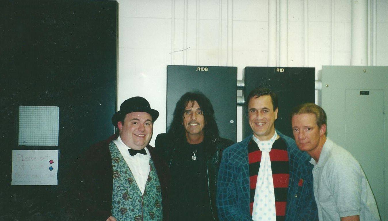 Wes Martin, Hamilton Mitchell and Bob Sorenson backstage with Alice Cooper. (Photo credit unknown)