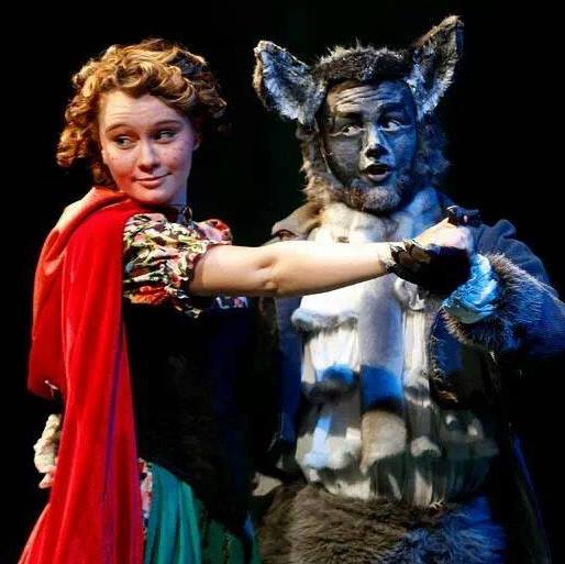 Grand Canyon College. 2014. Into the Woods. Rachel Callahan as Little Red Riding Hood and Cole Brackney as the Wolf. Photo credit not provided.